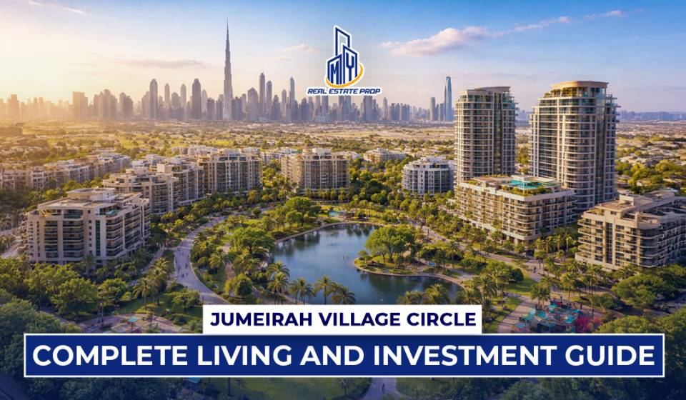 Aerial view of Jumeirah Village Circle real estate with modern apartments, green parks, and Dubai skyline in background